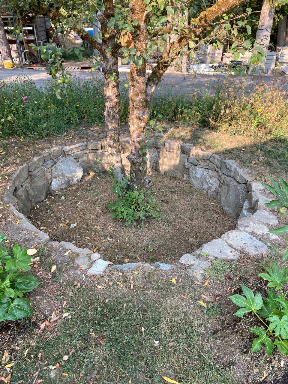 A dry stone well designed by the Drystone Masonry team